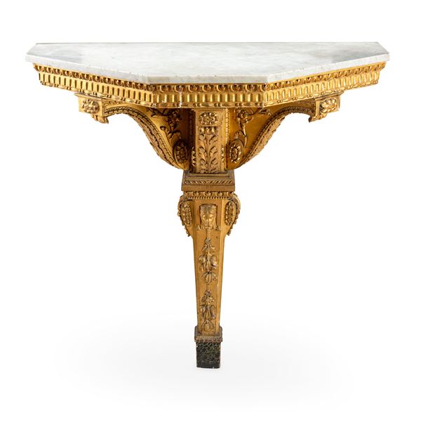 Console pensile in legno intagliato e dorato a motivi neoclassici