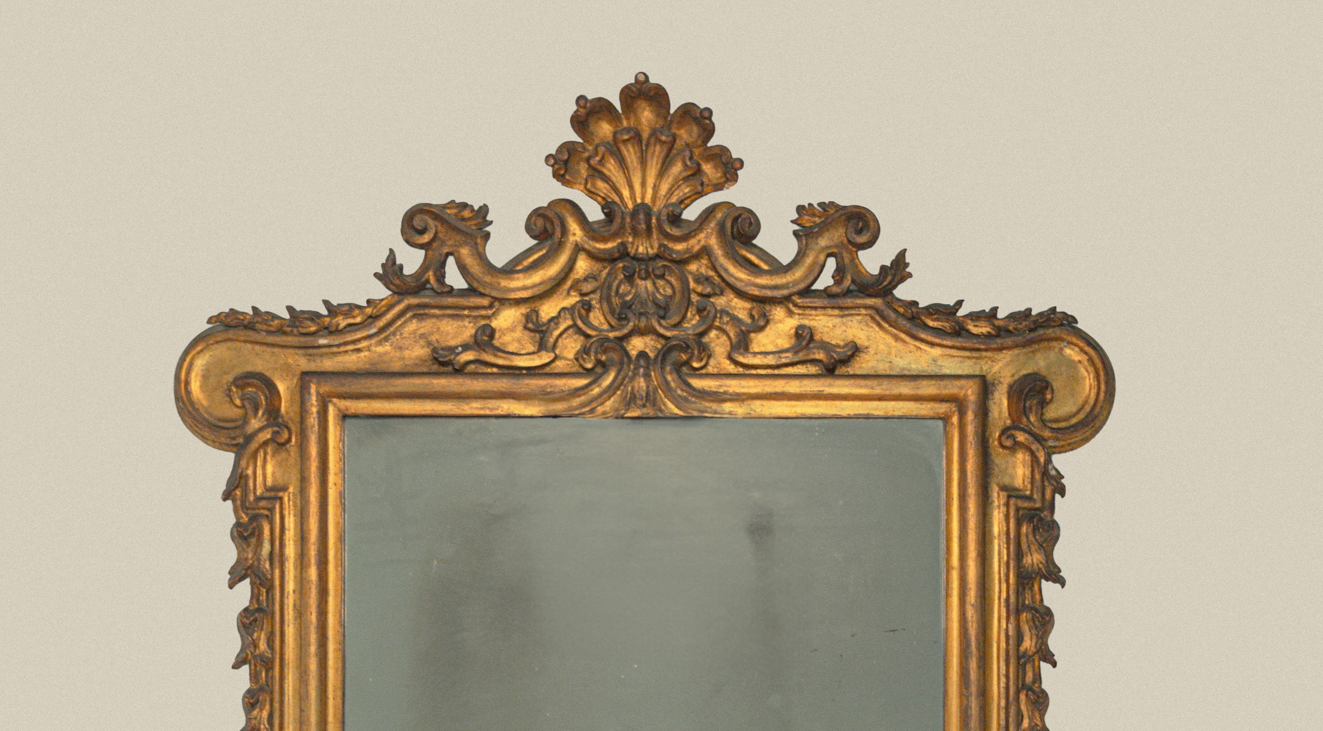 Specchiera in legno scolpito e dorato