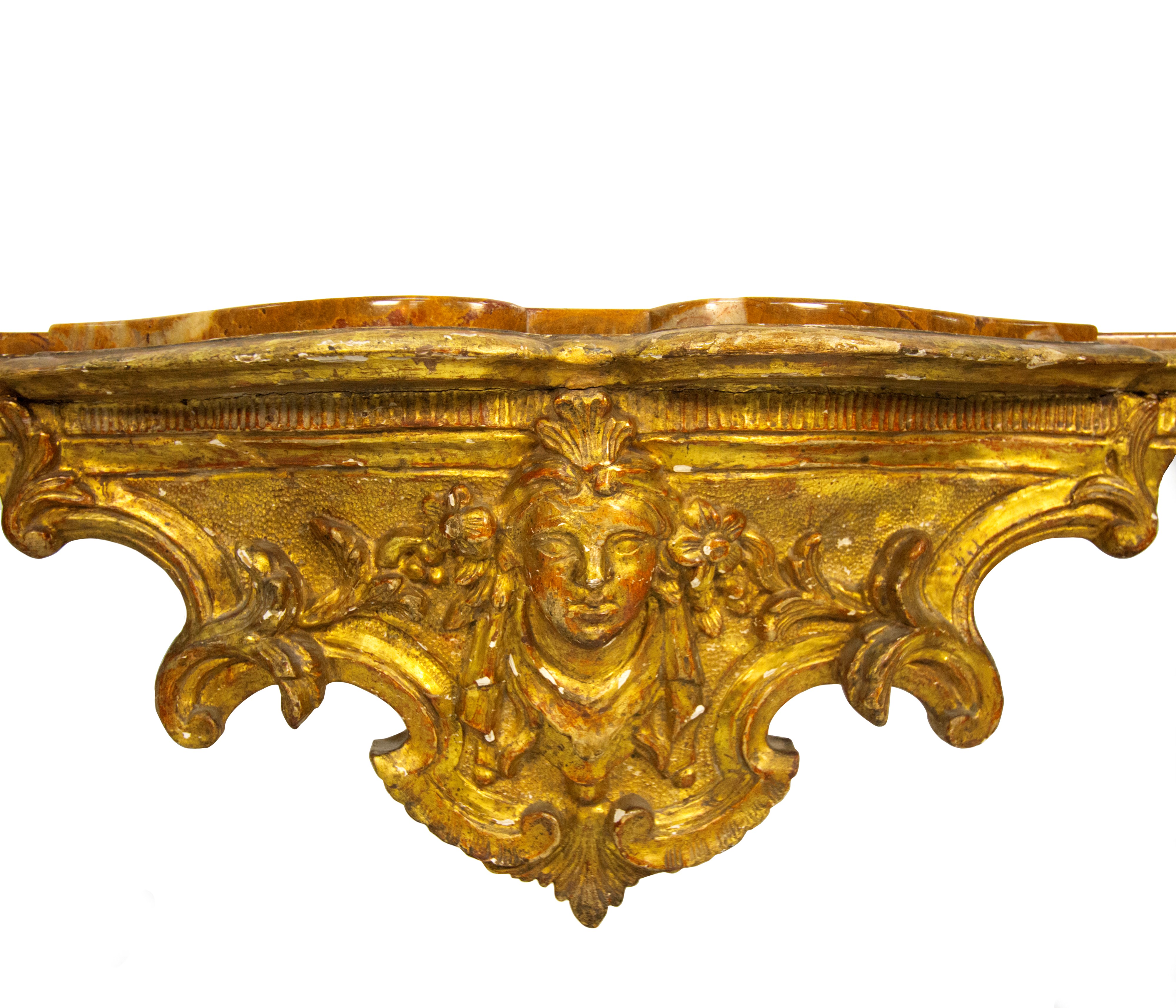 Console in legno scolpito e dorato