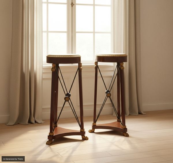 Coppia di gueridon in mogano, di gusto Impero