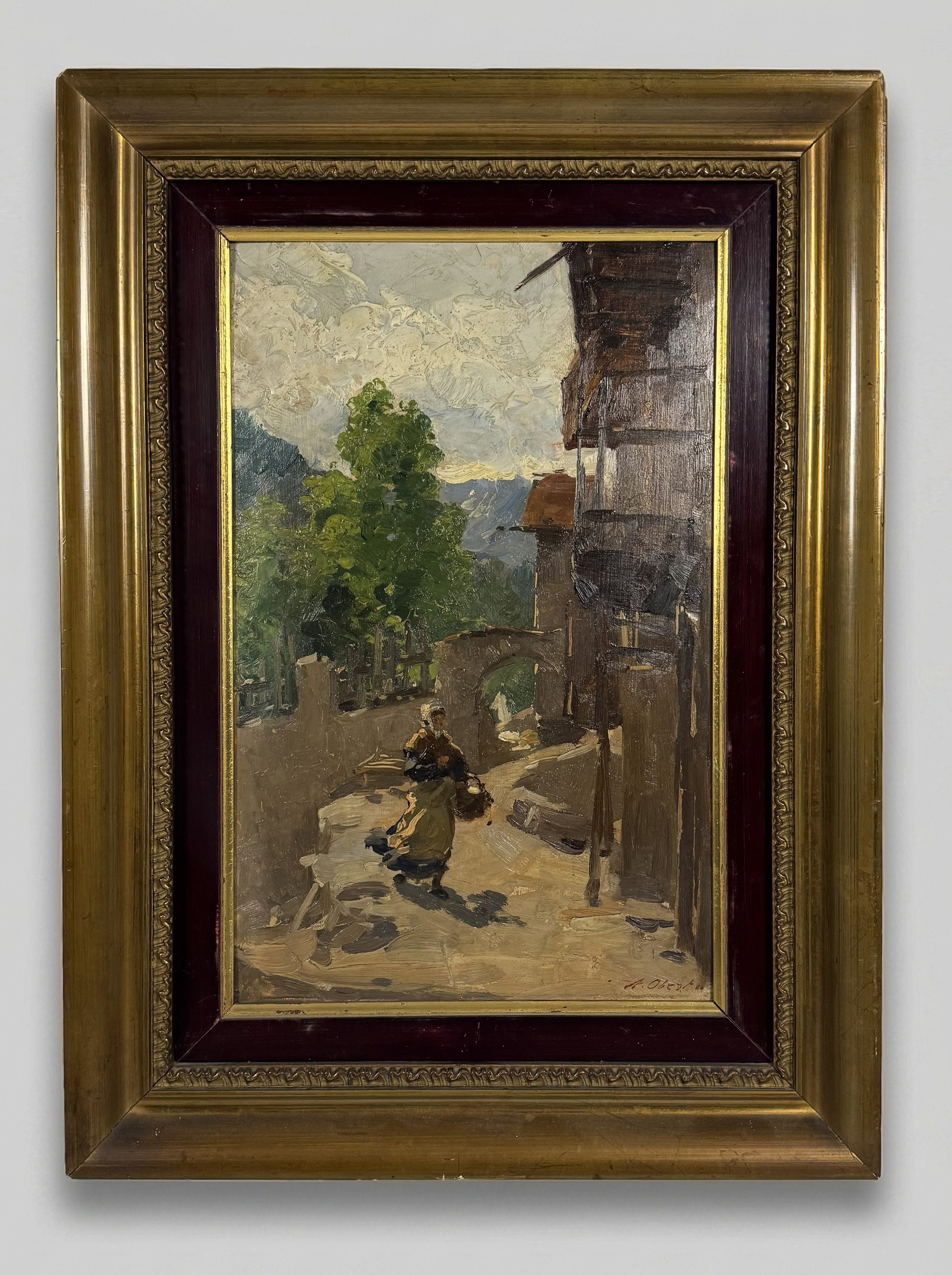 Scorcio di paese con contadina